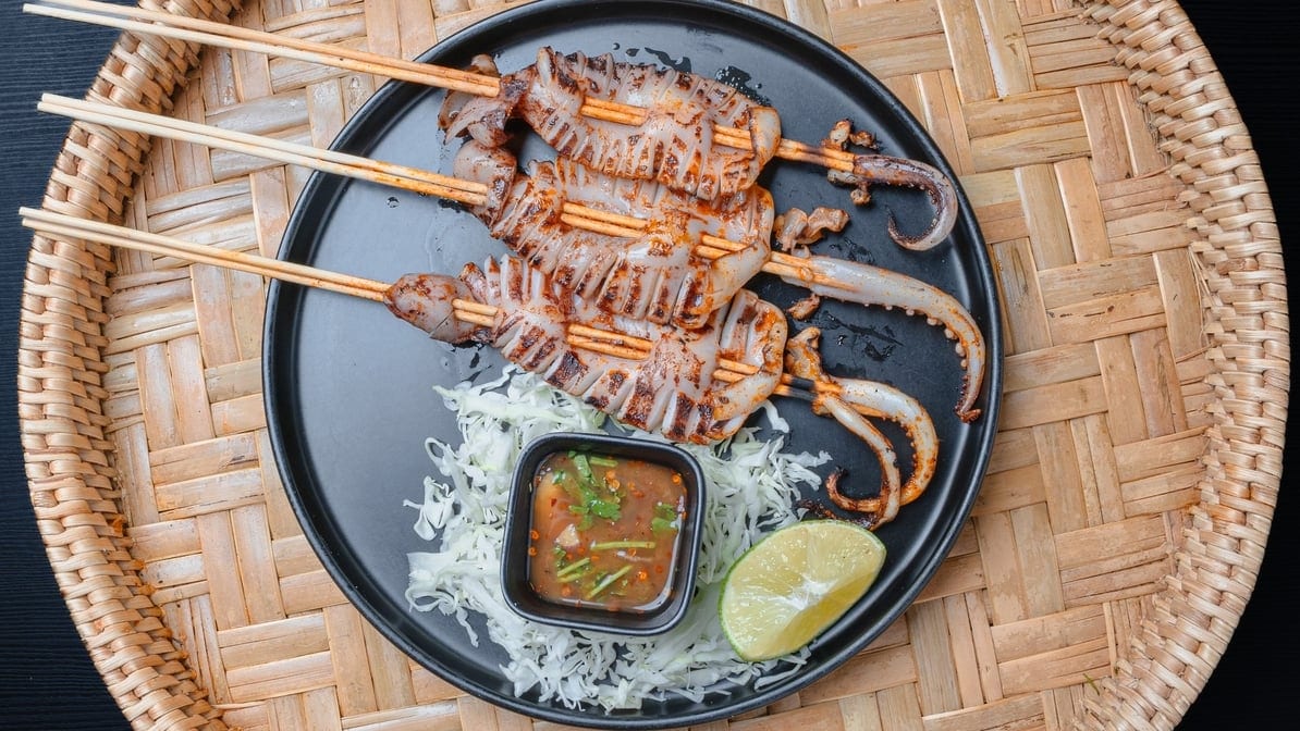 Night Market Squid ປີ້ງປາມືກ.